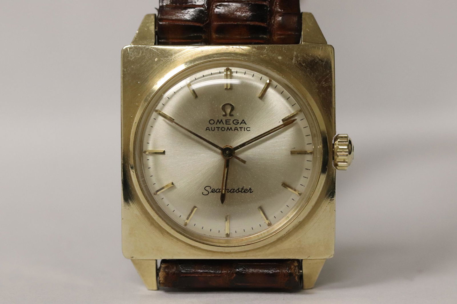 Unusual shaped 14K Omega seamaster wrist watch: Unusual shaped 14K Y/G Omega seamaster automatic wrist watch, it works, no guarantee to keep accurate time