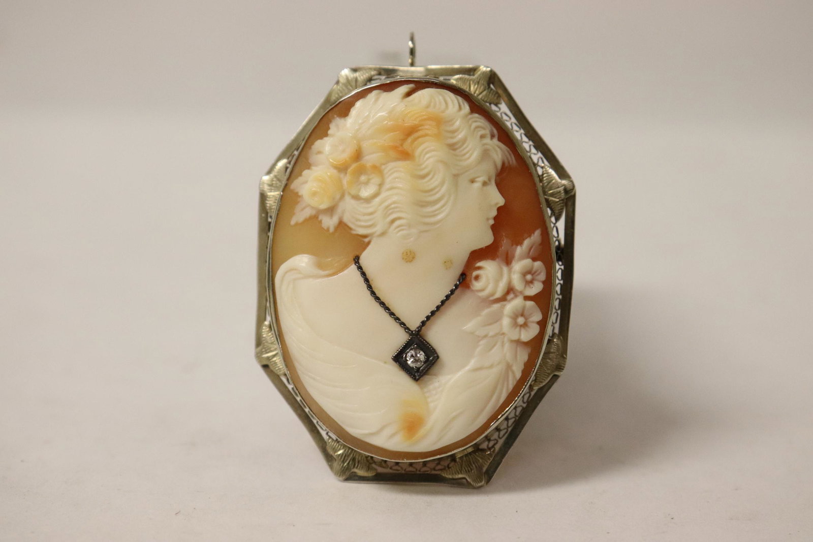 Victorian 14K framed shell cameo with diamond: A beautiful Victorian 14K framed shell cameo set with one small diamond, 1.8"x1.3"