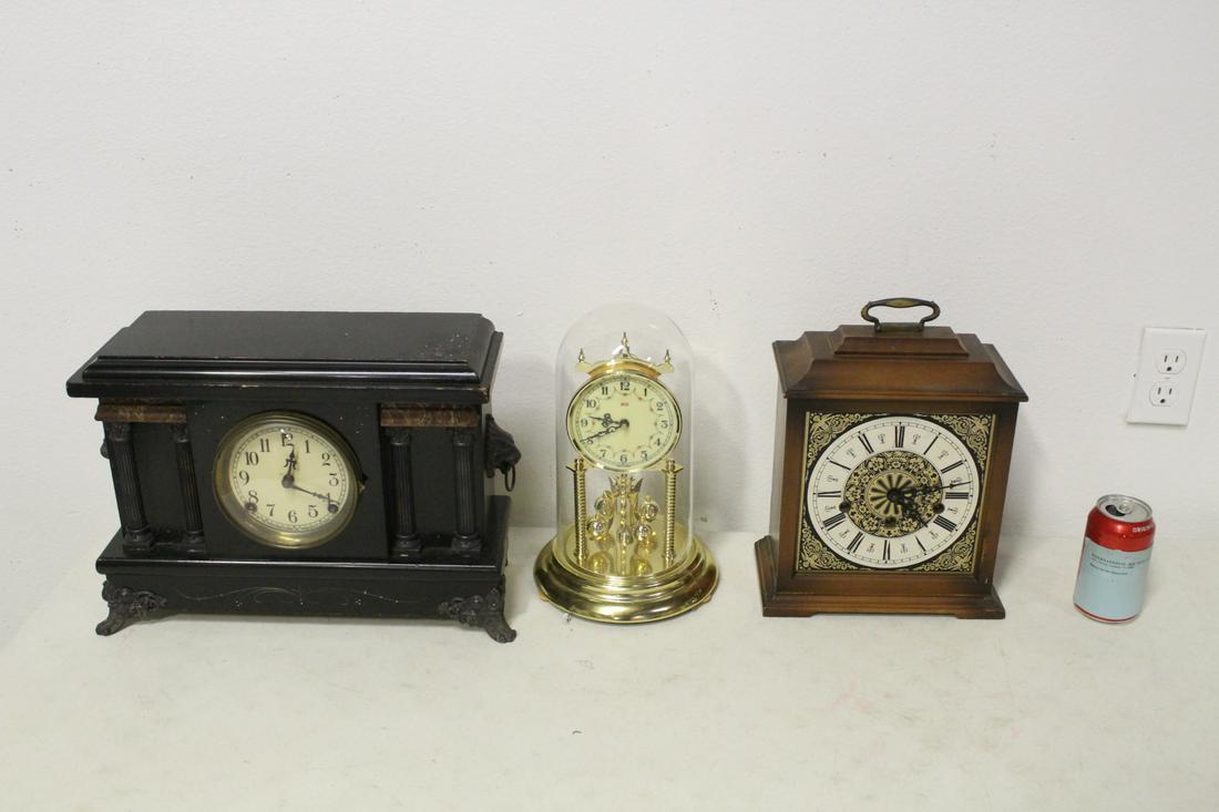A dome clock, and 2 vintage table clocks: A dome clock (12.25"H), and 2 vintage table clocks (12.75"H, 11.4"H)