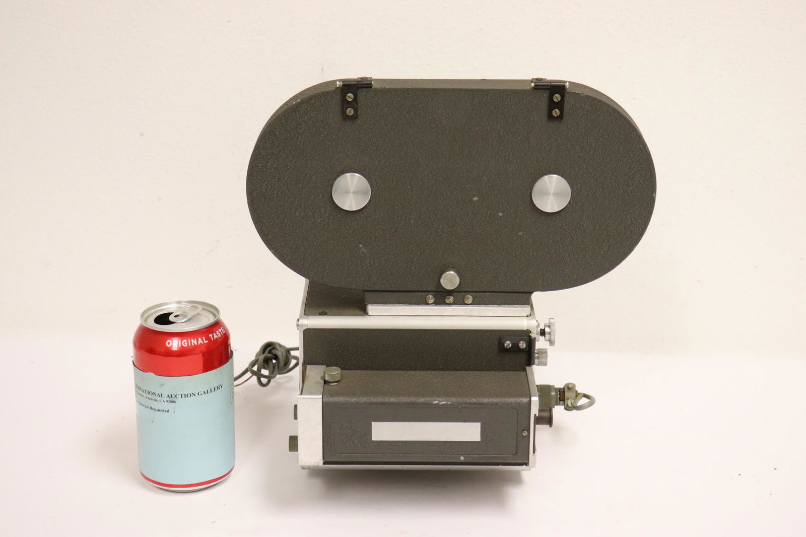 An early movie projector: An early movie projector, 11"Hx10.5"x7.8"