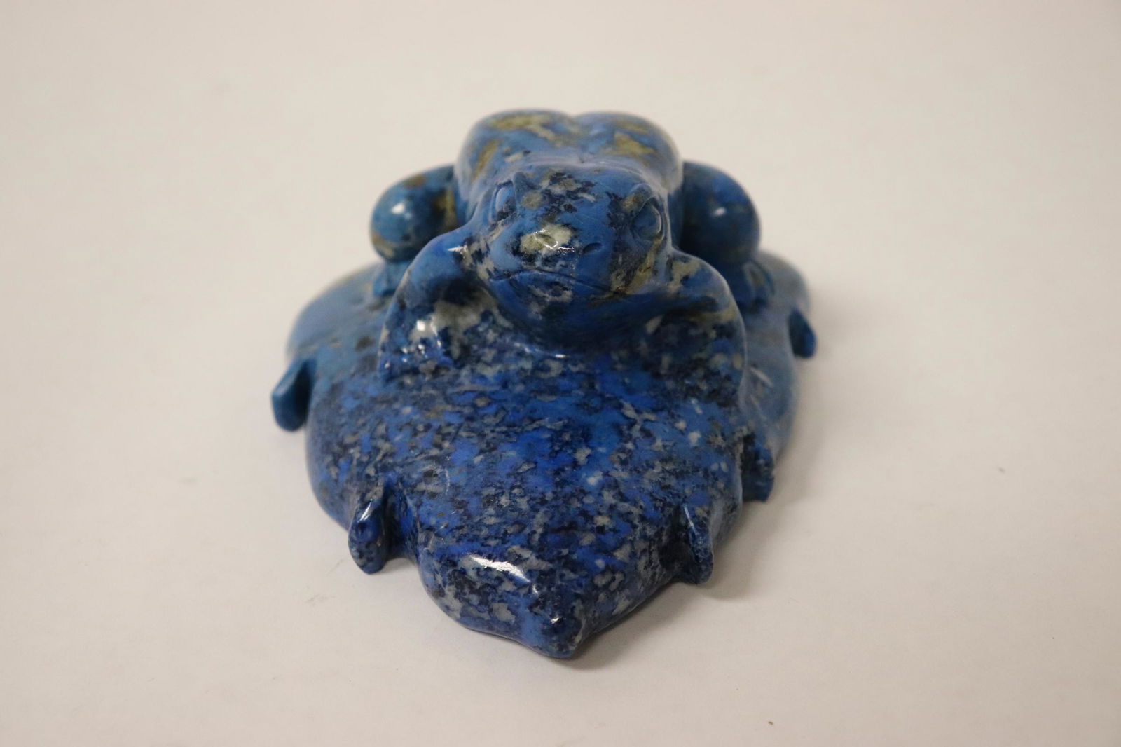 Lapis carving depicting frog on rock (1 of 9)