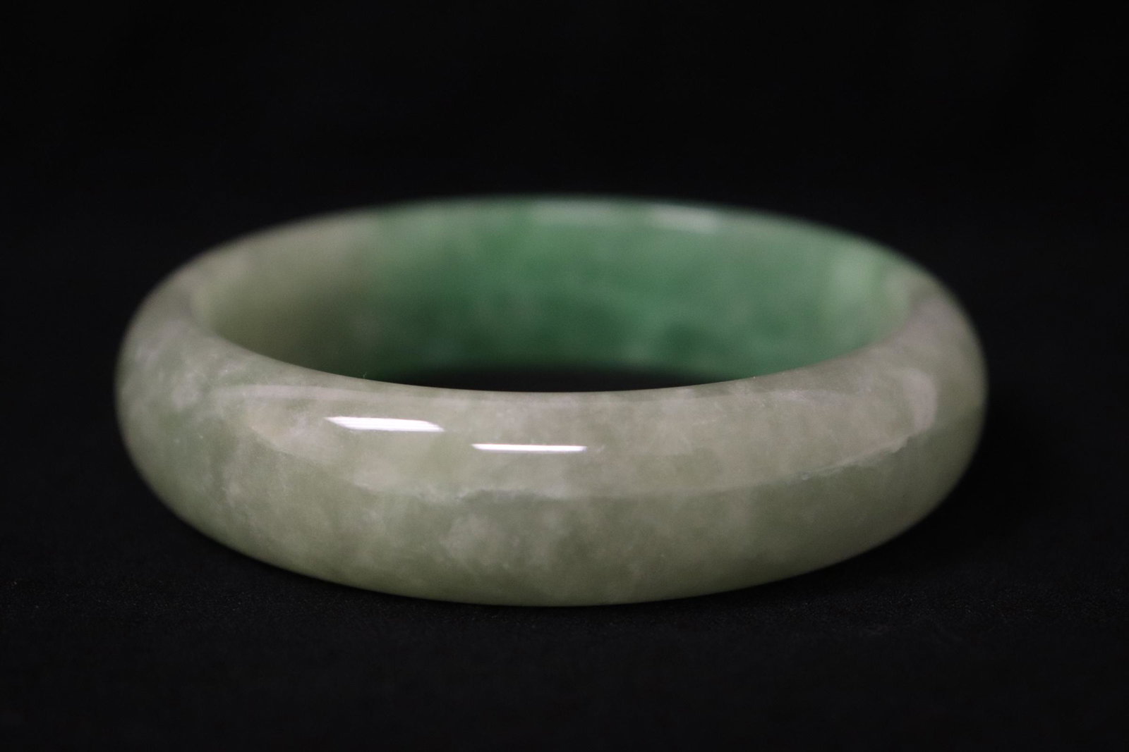 A jadeite like bangle: A jadeite like bangle, 0.65"x2.9"od(2.35"id)