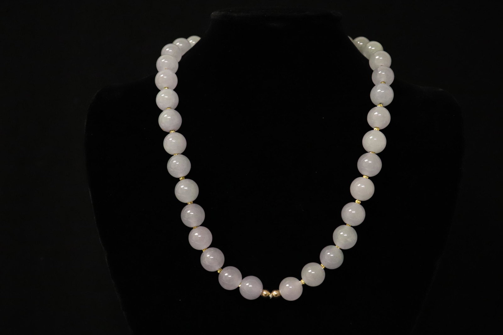 Large lavender jadeite bead necklace: Large lavender jadeite bead necklace, each bead measures 13mm diameter, with 14K W/G clasp