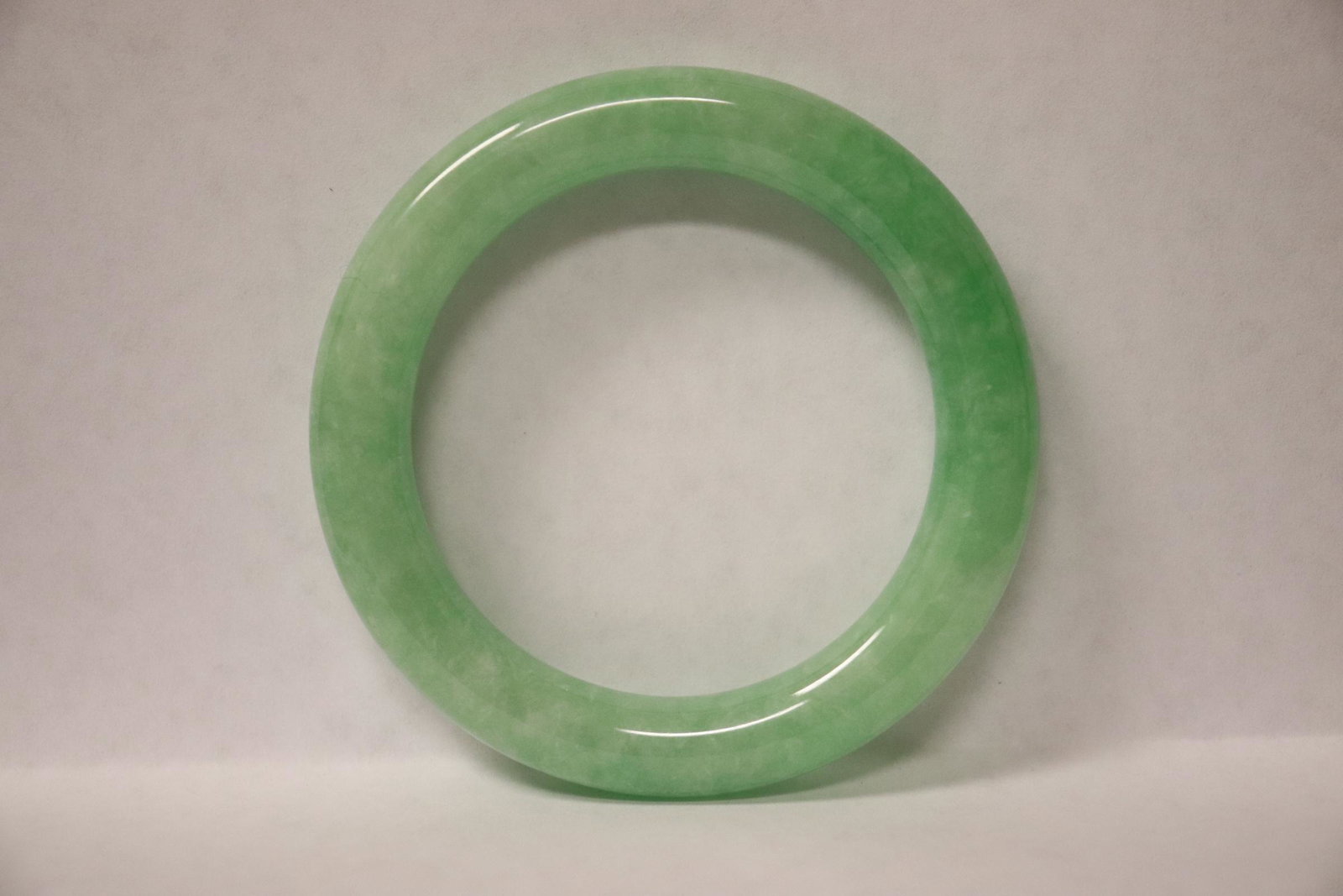 Chinese jadeite like bangle: Chinese jadeite like bangle, 0.45"x3.05"od(2.3"id)
