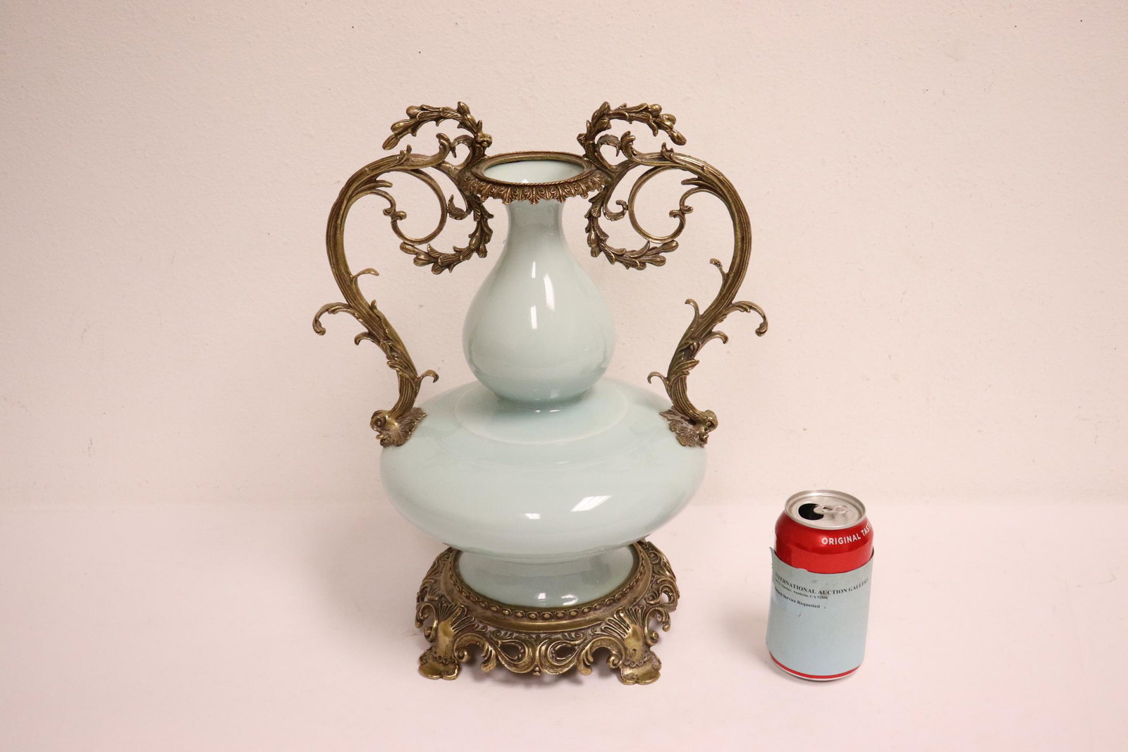 sky blue porcelain vase with bronze ormolu: A beautiful sky blue porcelain vase with bronze ormolu, 15.3"Hx12.2"x8.9"