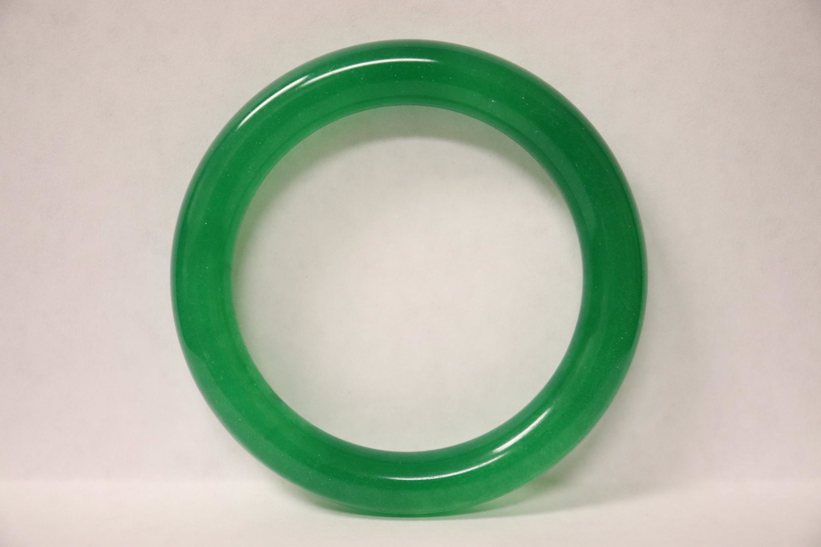 Chinese jadeite like bangle: Chinese jadeite like bangle, 0.4"x3.05"od(2.25"id)