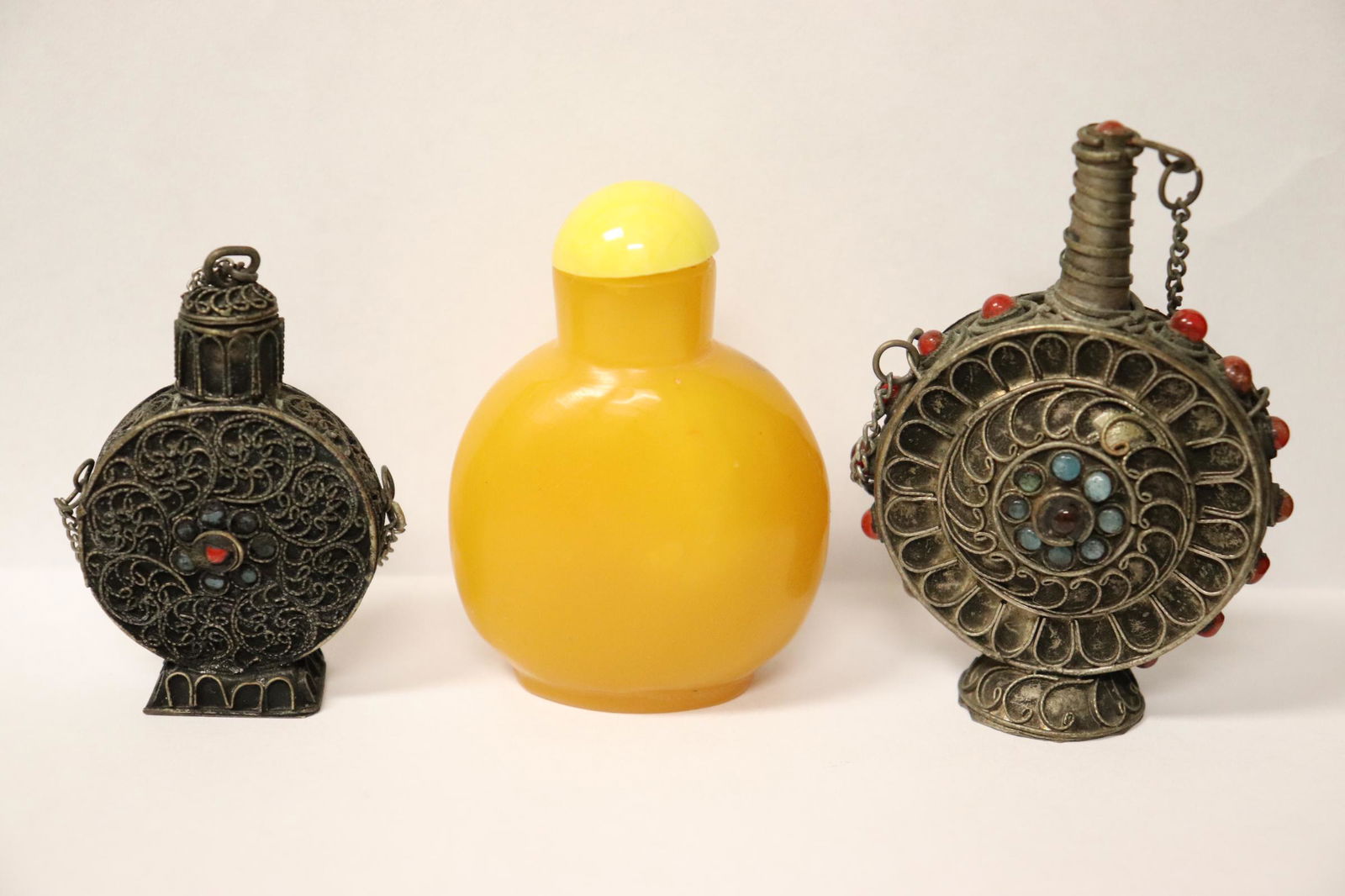 2 silver like snuff bottles, & an amber like snuff (1 of 11)