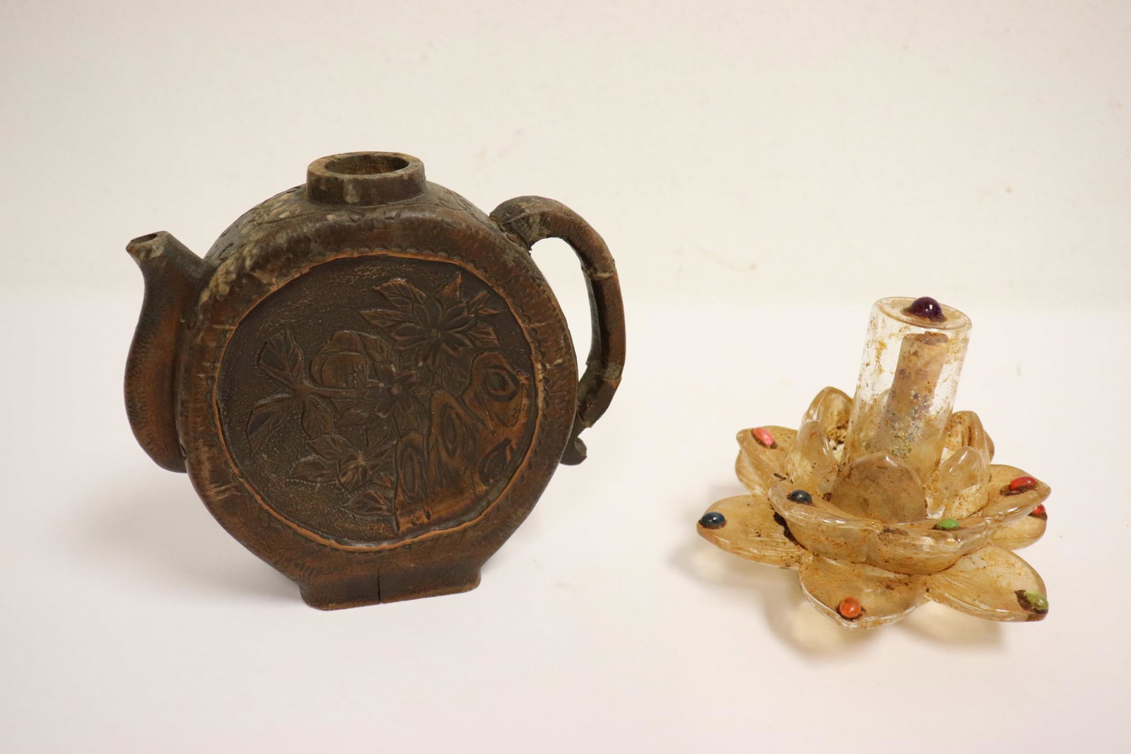 A crystal ornament, & an antique wood wine flask: A crystal ornament (4"Hx4.88"dia), and an antique wood carved wine flask(5.3"Hx5.75"x1.65")