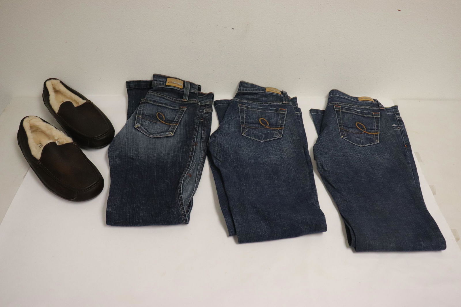 3 pair of jeans, and pair Ugg slip shoes (size 11) in (1 of 11)