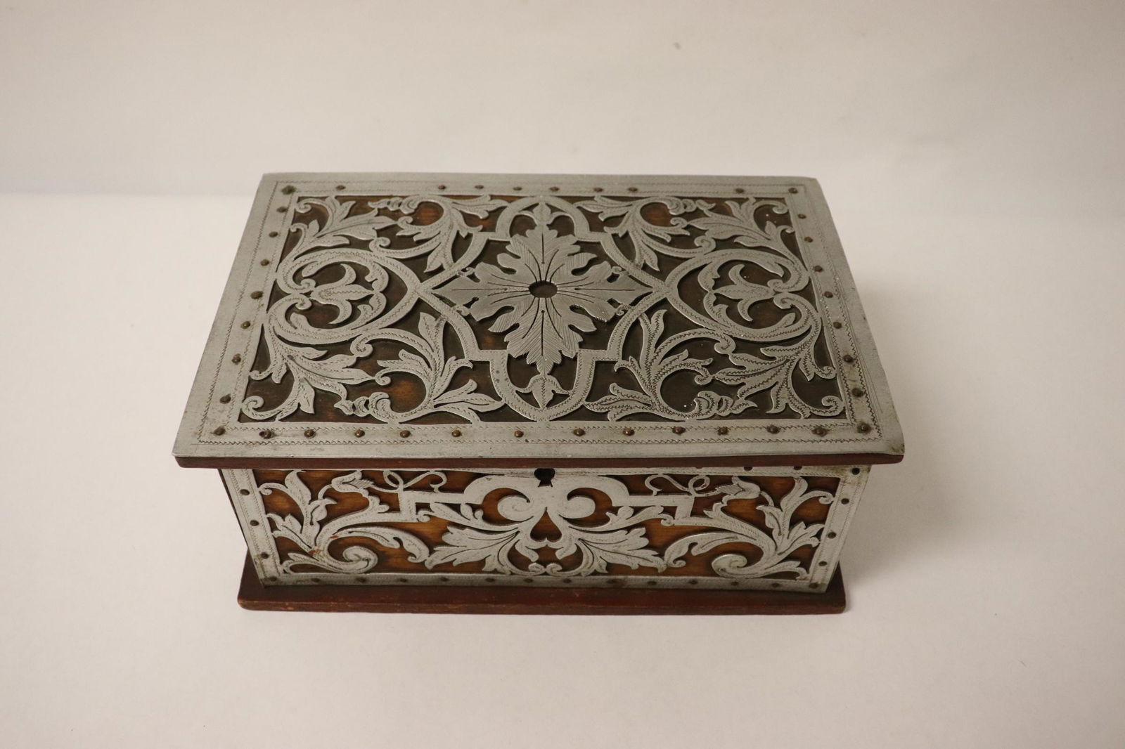 Unusual wood dressing box with metal overlay (1 of 9)