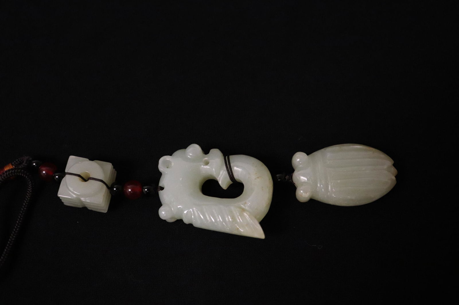 3 Chinese jade carved ornaments on a string (1 of 10)