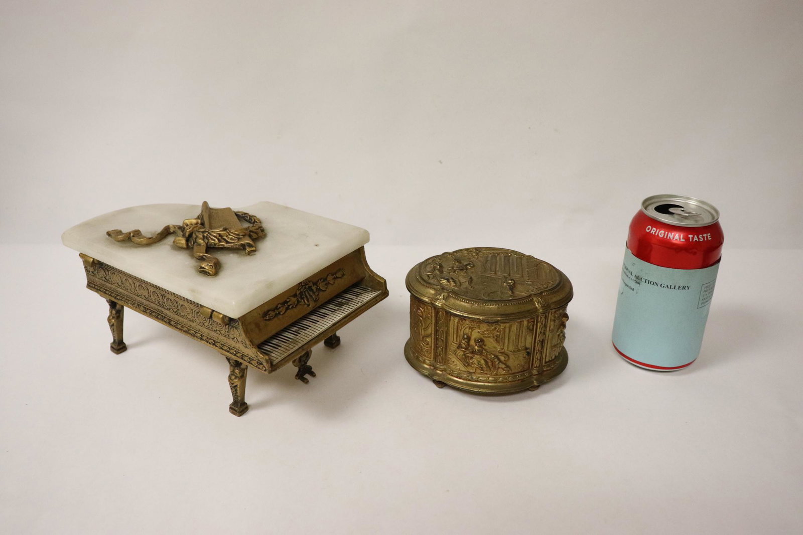 Gilt metal jewelry box, & a music box: Gilt metal jewelry box (3.2"Hx4.85"x4.05"), and a gilt metal and marble music box(4.63"Hx8.15"x5.35")