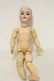 Antique bisque head doll by Simon and Halbig