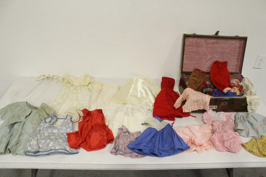 Lot of vintage doll clothes with an old doll case (1 of 10)
