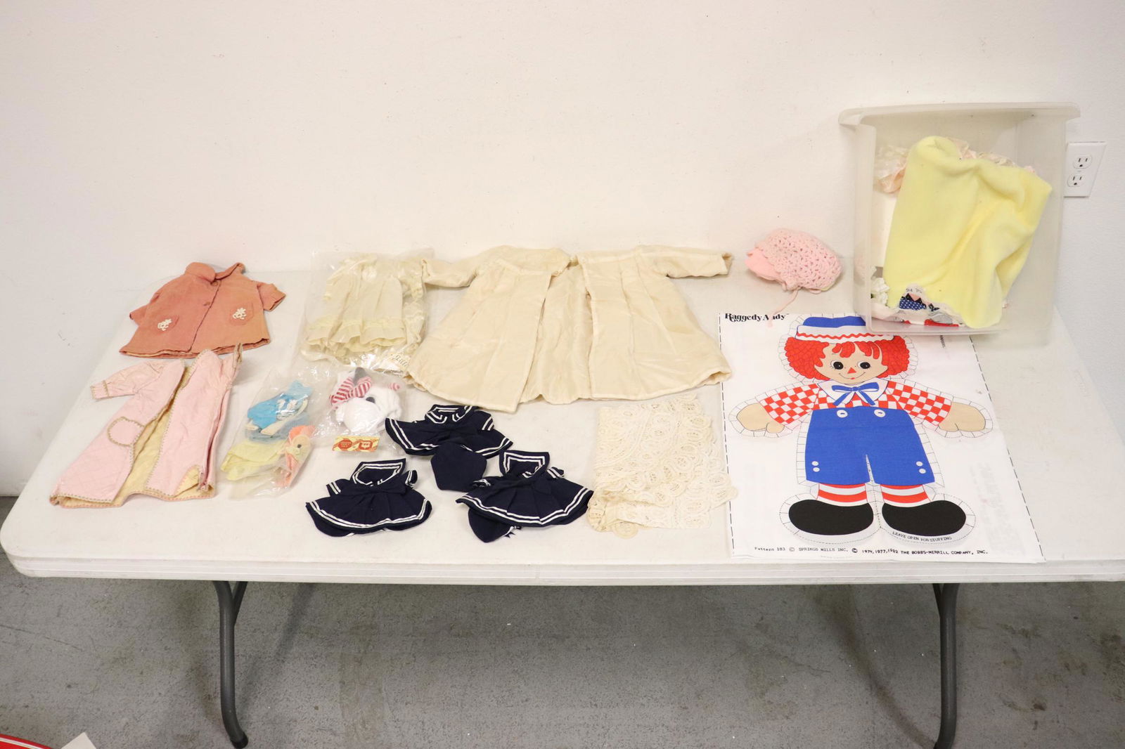 Lot of doll clothes and doll clothes material (1 of 10)