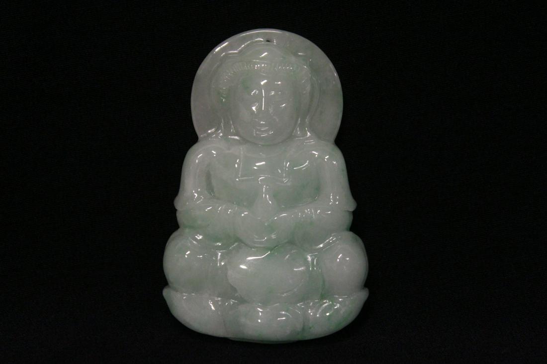 apple green jadeite carved pendant in Buddha motif: A fine apple green jadeite carved pendant in Buddha motif, 2.8"x1.85"x0.5"