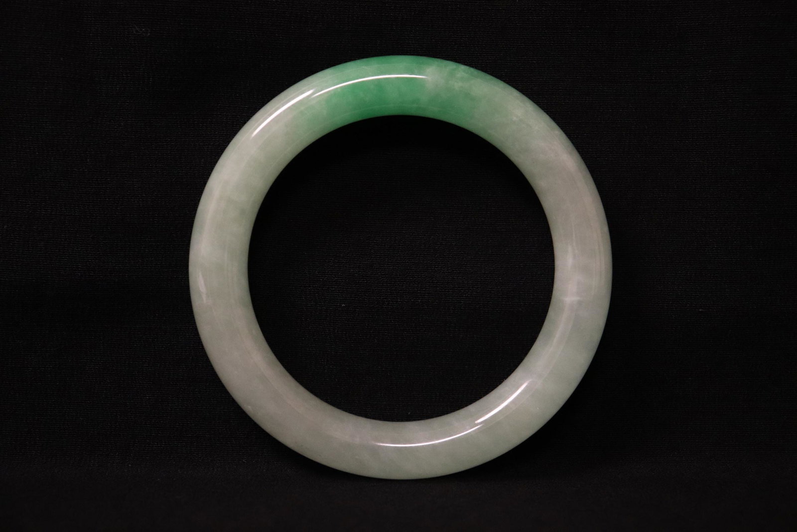 Chinese jadeite like bangle: Chinese jadeite like bangle, 0.5"x3.25"od(2.38"id)