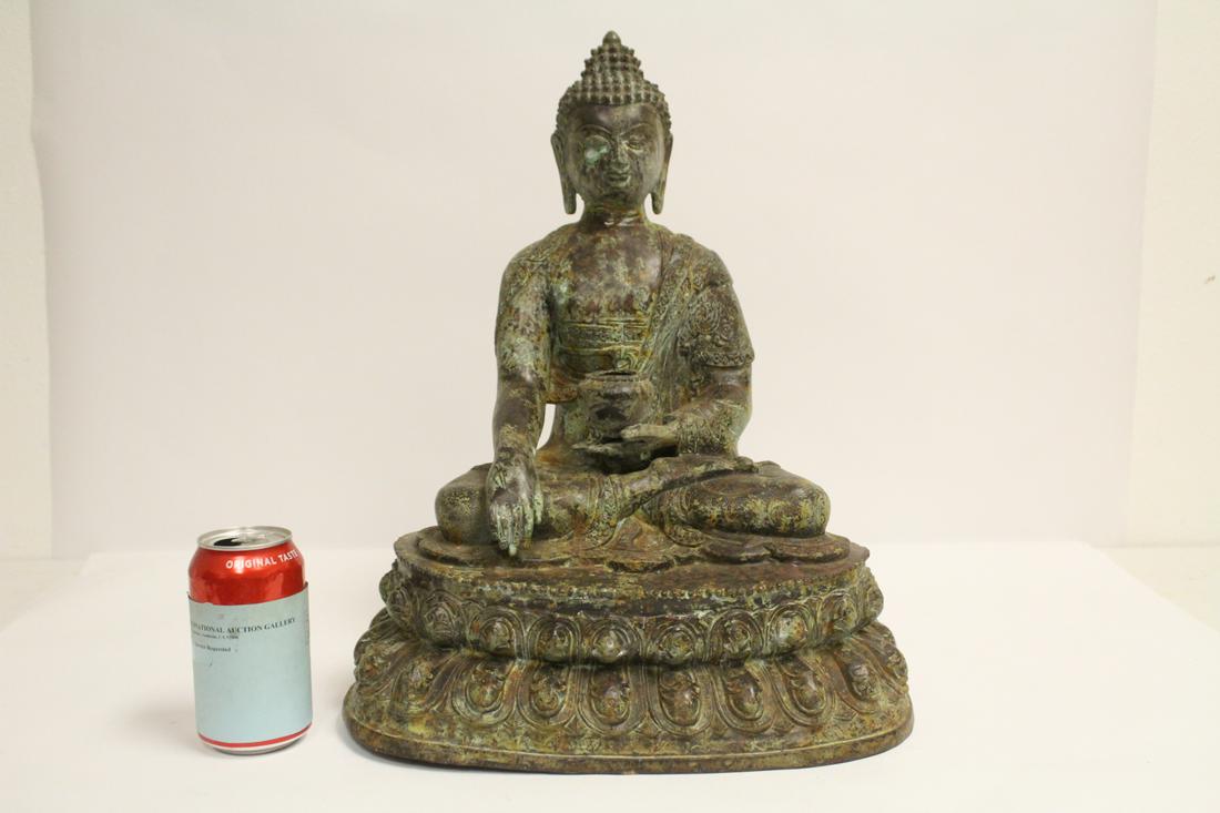 A large Chinese bronze sculpture of deity (1 of 10)