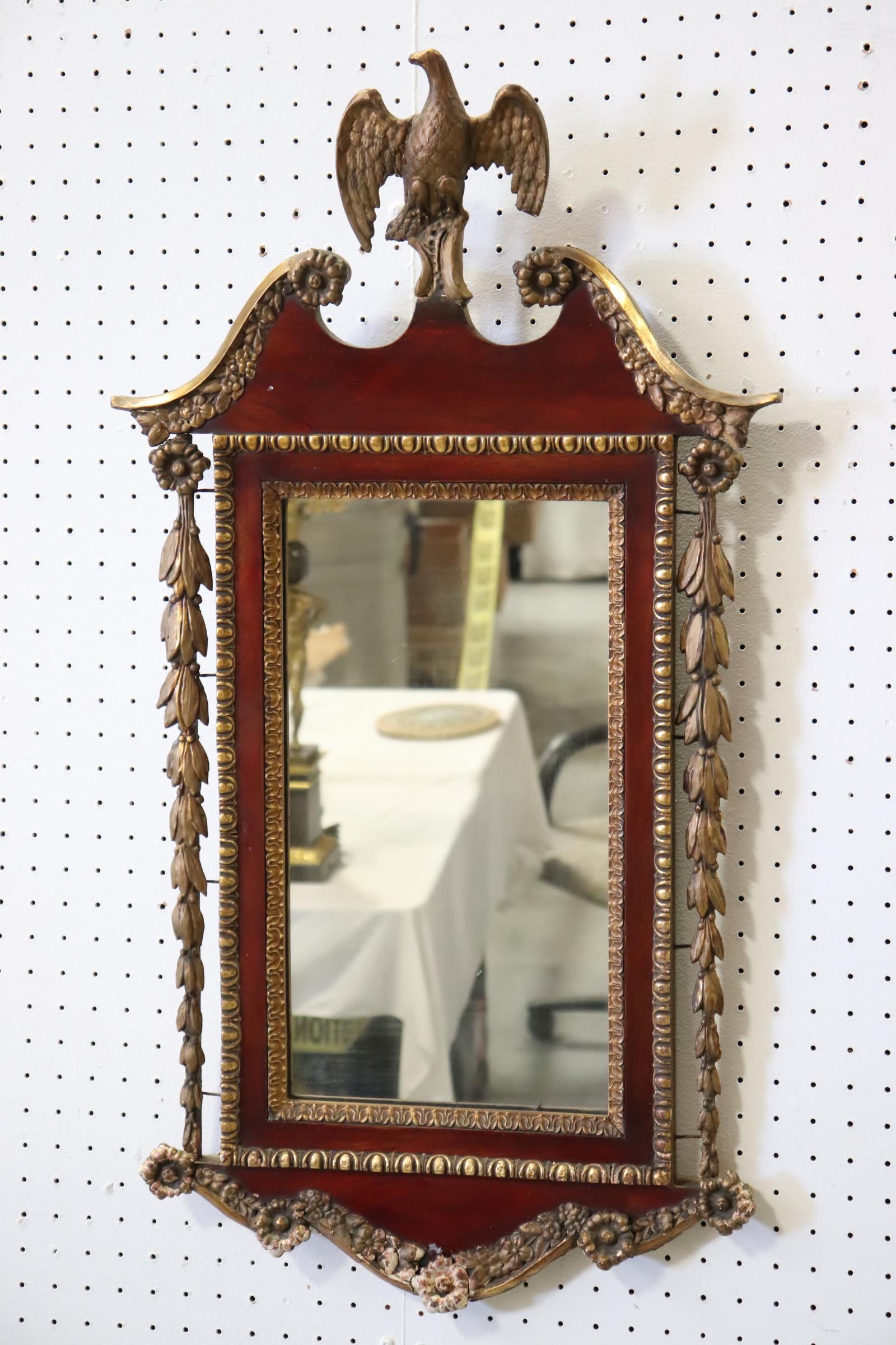 Antique French giltwood mirror with eagle on top: Antique French giltwood mirror with eagle on top, repair on bottom, 34.5"H