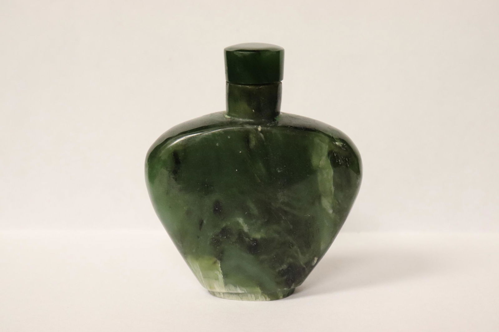 A fine spinach jade carved snuff bottle (1 of 10)