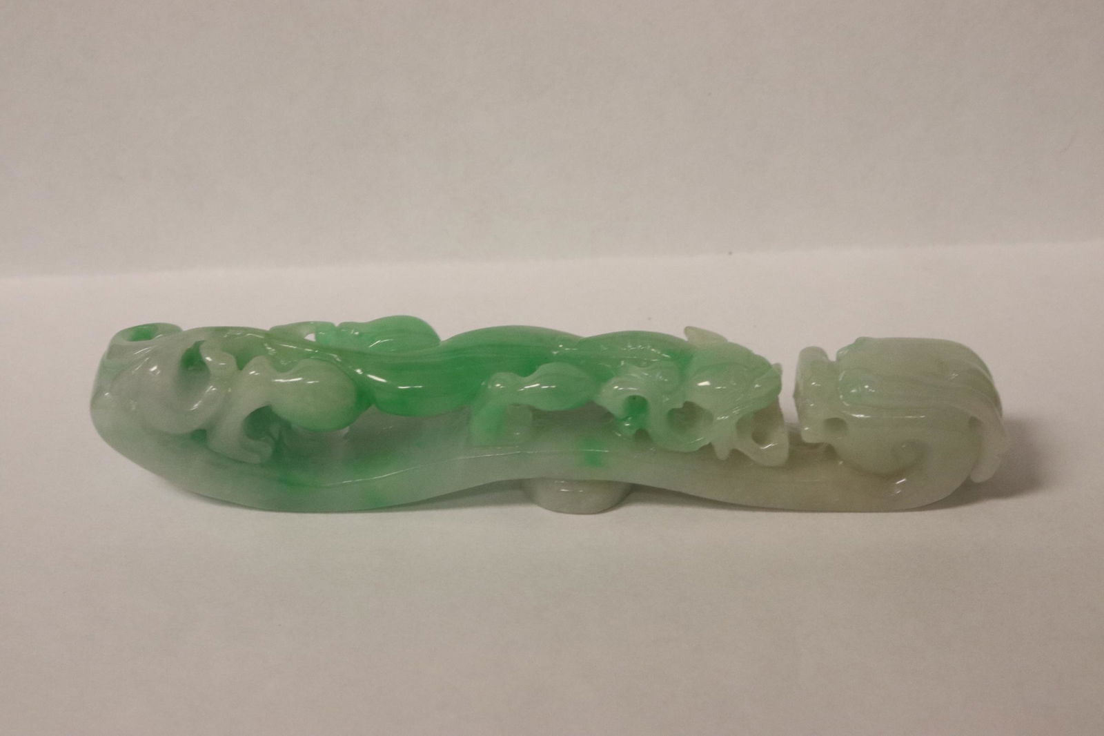 An apple green jadeite carved belt buckle (1 of 11)