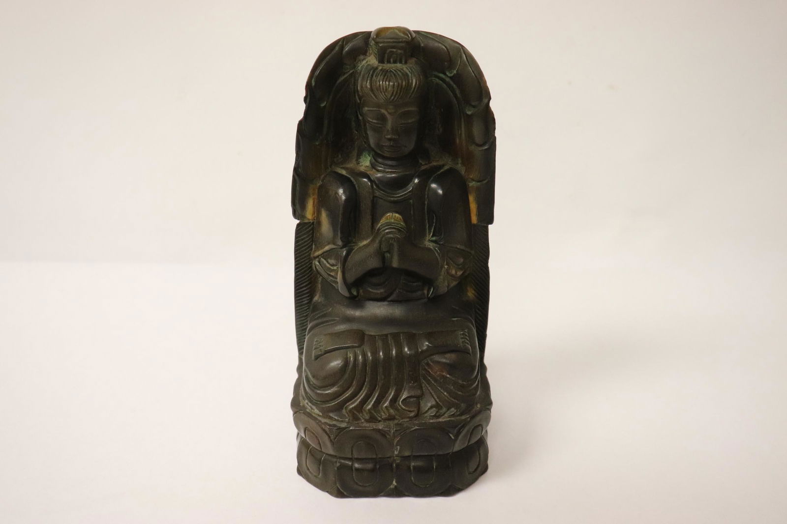 Chinese horn like carving depicting portrait of deity (1 of 10)
