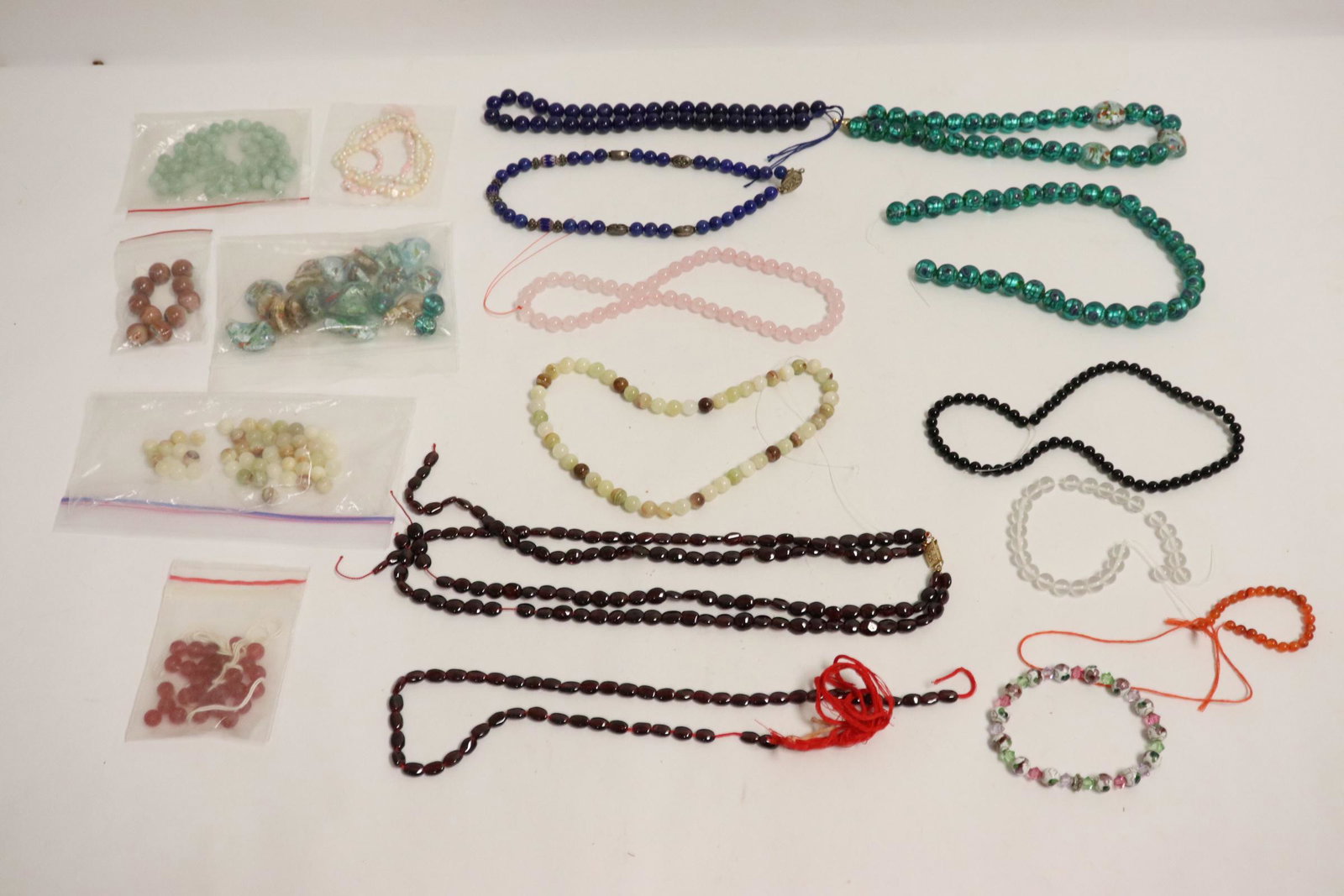 Lot of misc. bead necklaces and bracelets: Lot of misc. bead necklaces and bracelets; including lapis beads, need repair