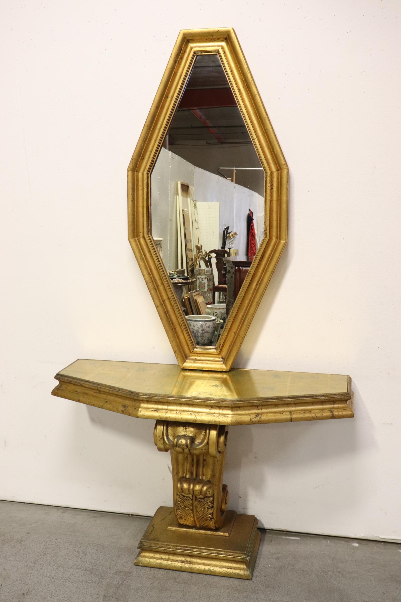 gilt wood console table with matching mirror: A gilt wood console table (28.8"Hx44.8"x15.25") with matching gilt wood mirror (50.25"x24.2")