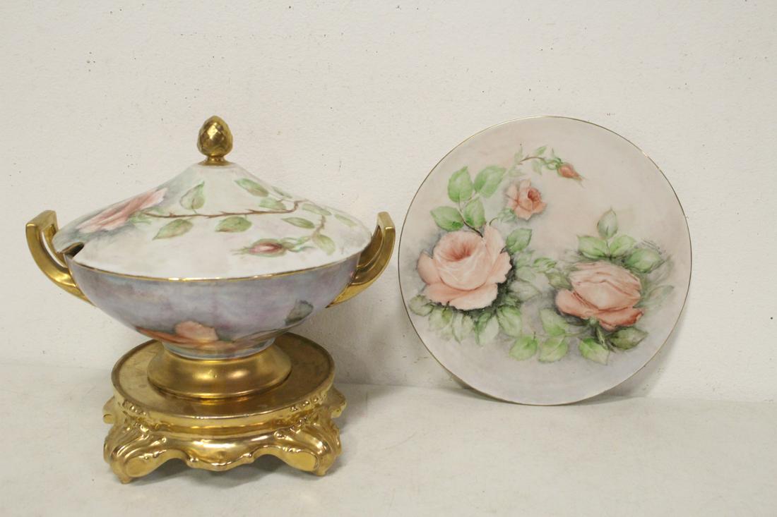 A German hand painted covered tureen w/ pedestal &: A German hand painted covered tureen (9.4"Hx12.35"x10.38") with pedestal (2.8"Hx10.3"dia) and a matching plate (11.8"dia)