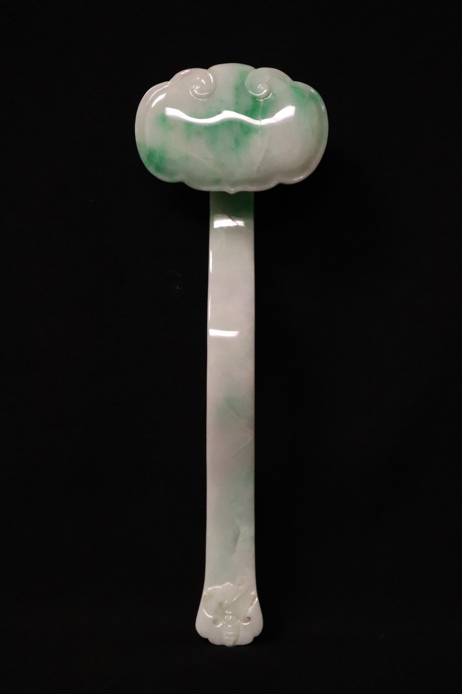 Chinese natural color jadeite carved ruyi: A beautiful Chinese natural color jadeite carved ruyi, 7"L