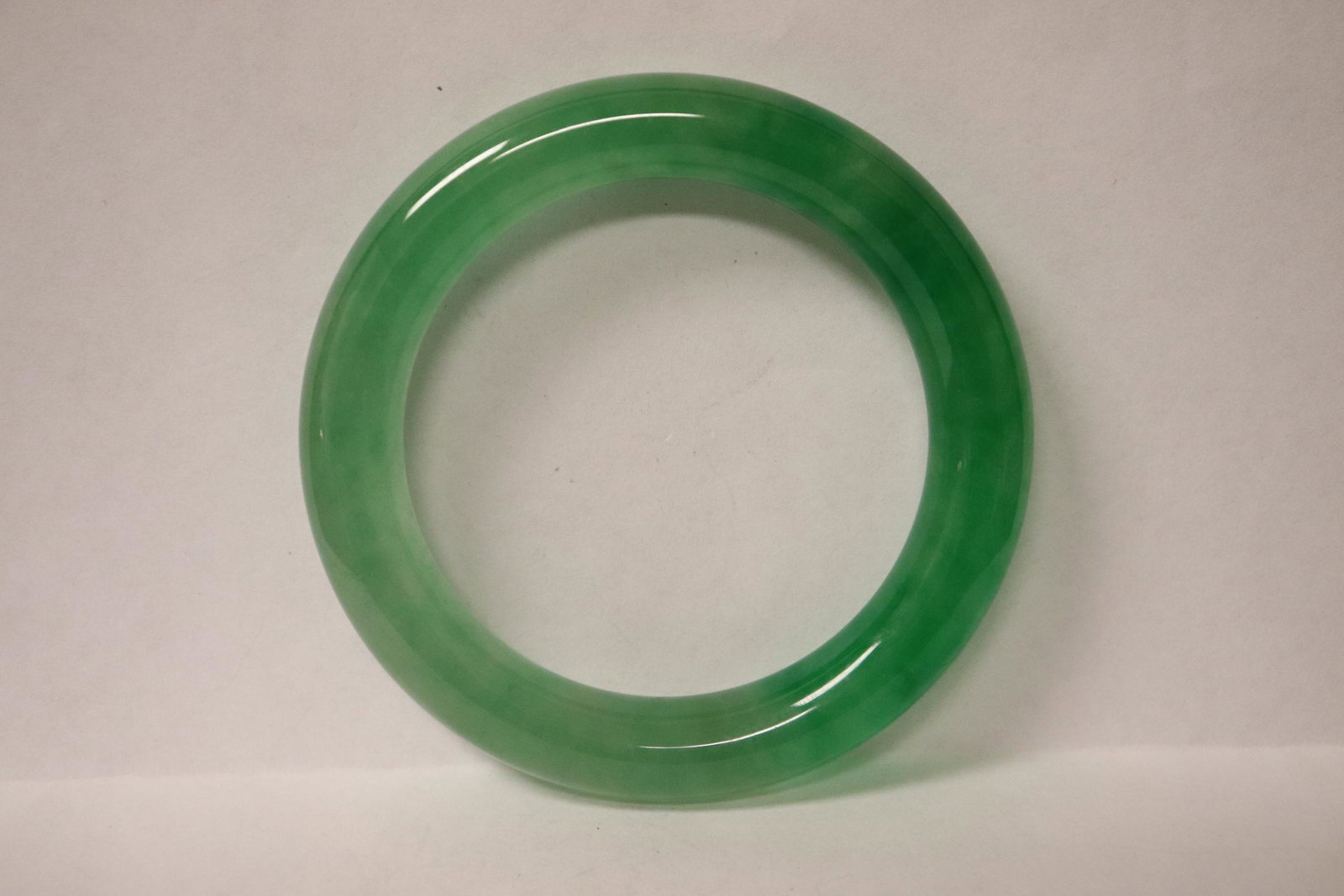 Chinese jadeite like bangle: Chinese jadeite like bangle, 0.5"x3.25"od(2.35"id)