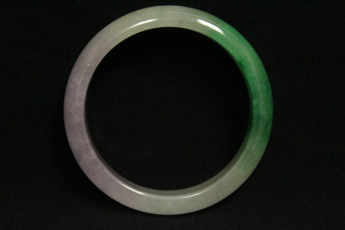 A jadeite like bangle: A jadeite like bangle, 0.55"x2.88"od(2.3"id)