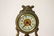 Gilt metal table clock with figure motif base - 4