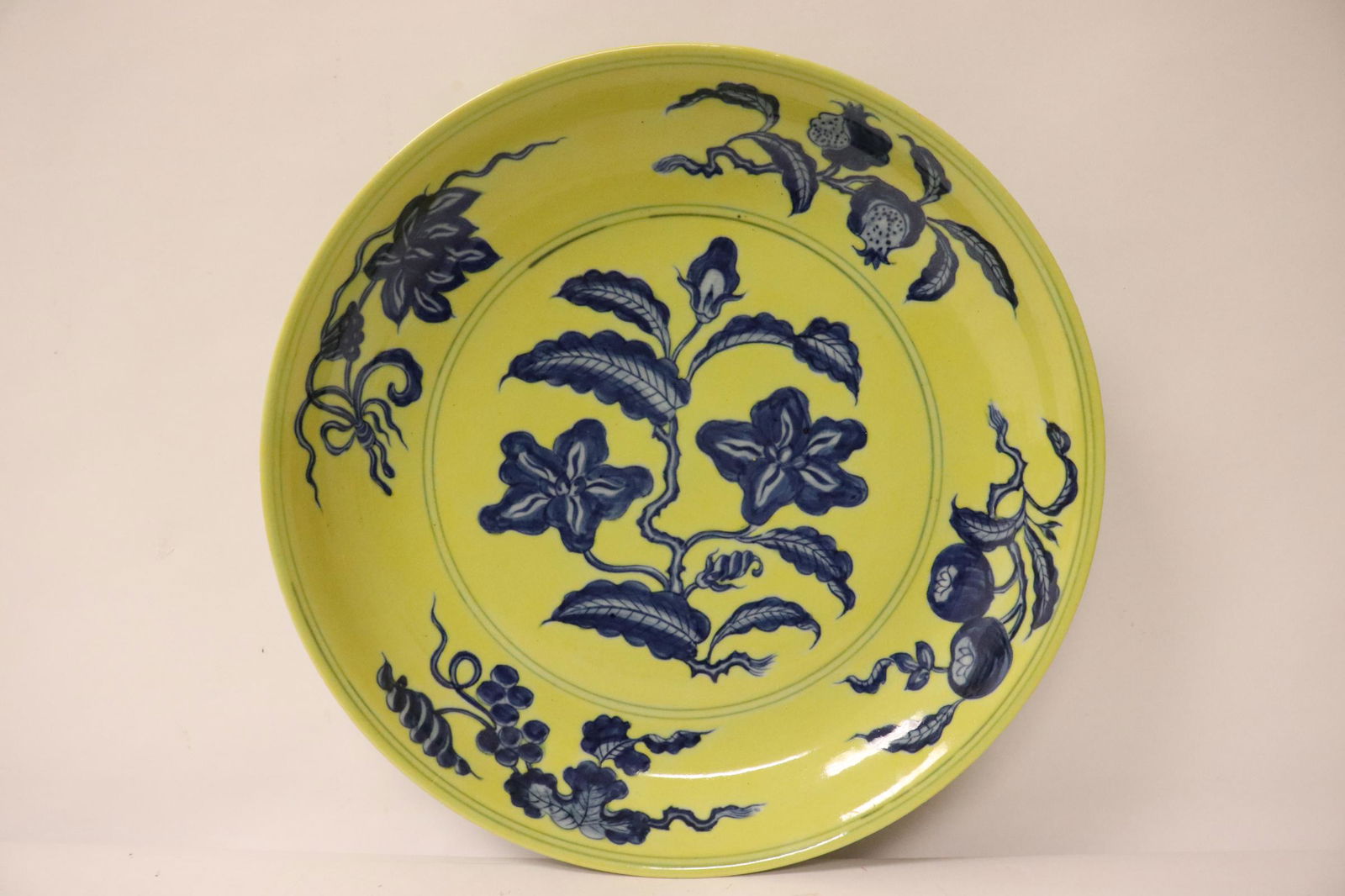 A fine Chinese blue on yellow porcelain plate (1 of 10)
