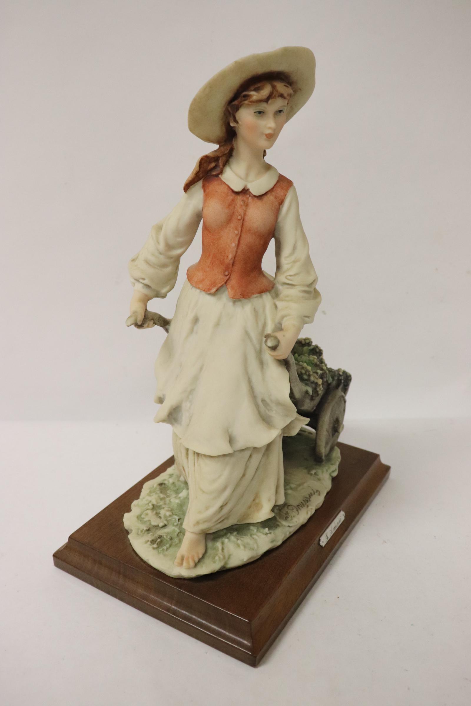 A fine sculpture figure by Armani (1 of 9)