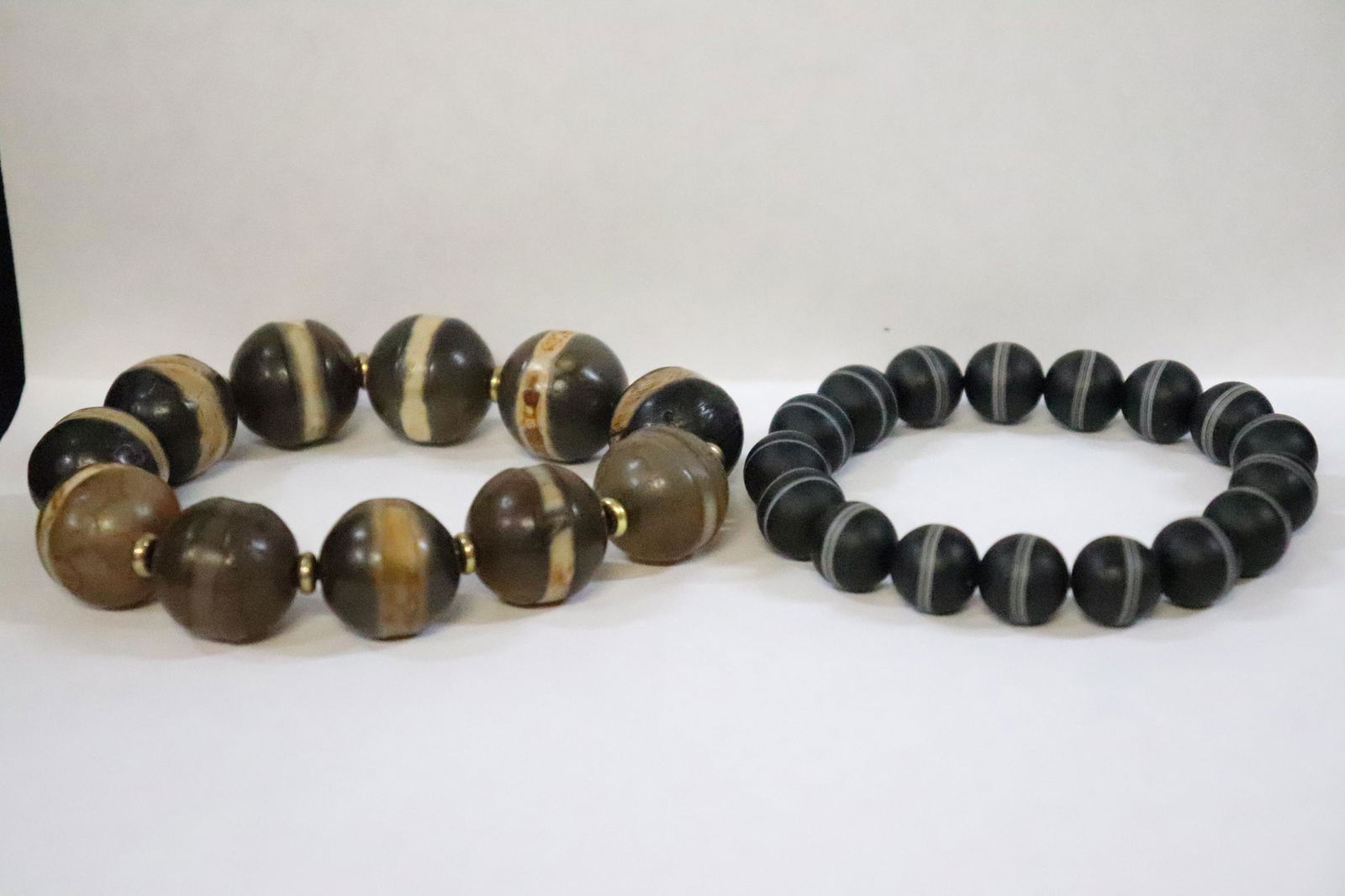 2 stone bead bracelets: 2 stone bead (0.5"dia, 0.8"dia) bracelets