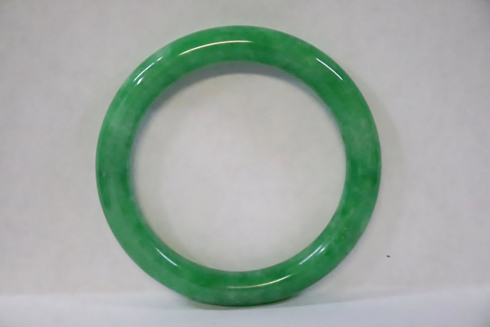 A jadeite like bangle: A jadeite like bangle, 0.38"x3"od(2.25"id)