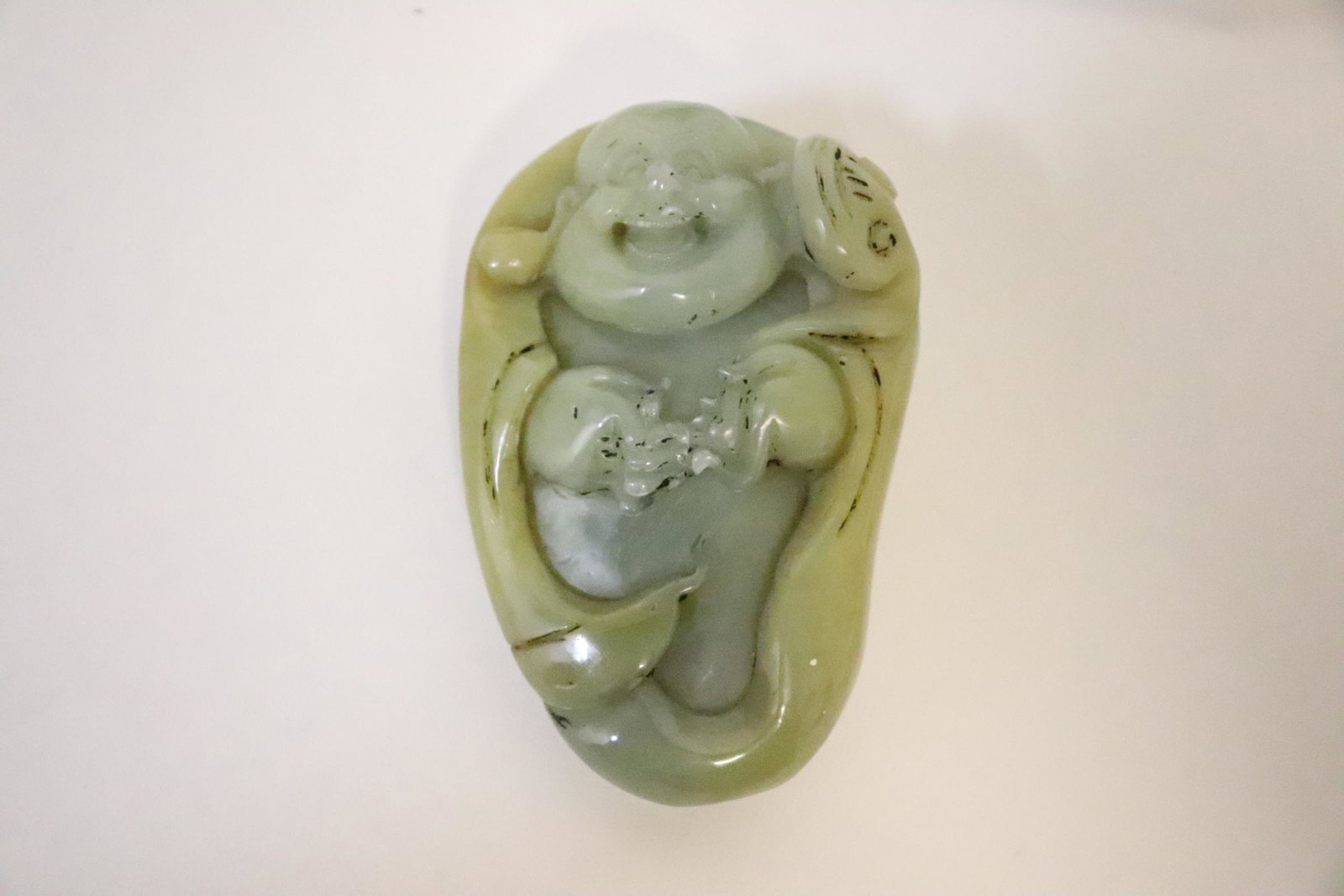 Chinese jadeite carved ornament in deity motif: Chinese jadeite carved ornament in deity motif, 2.75"x1.7"x1"