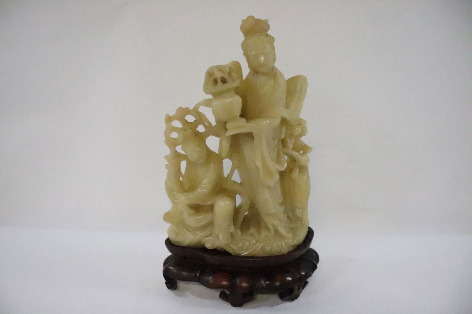 Chinese antique shoushan stone carving with stand: A beautiful Chinese antique shoushan stone (芙蓉石) carved Guanyin (10.25"H) with stand