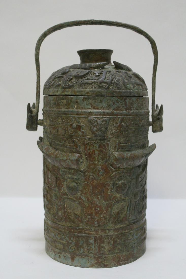 A large Chinese archaic style bronze handled hu (1 of 10)