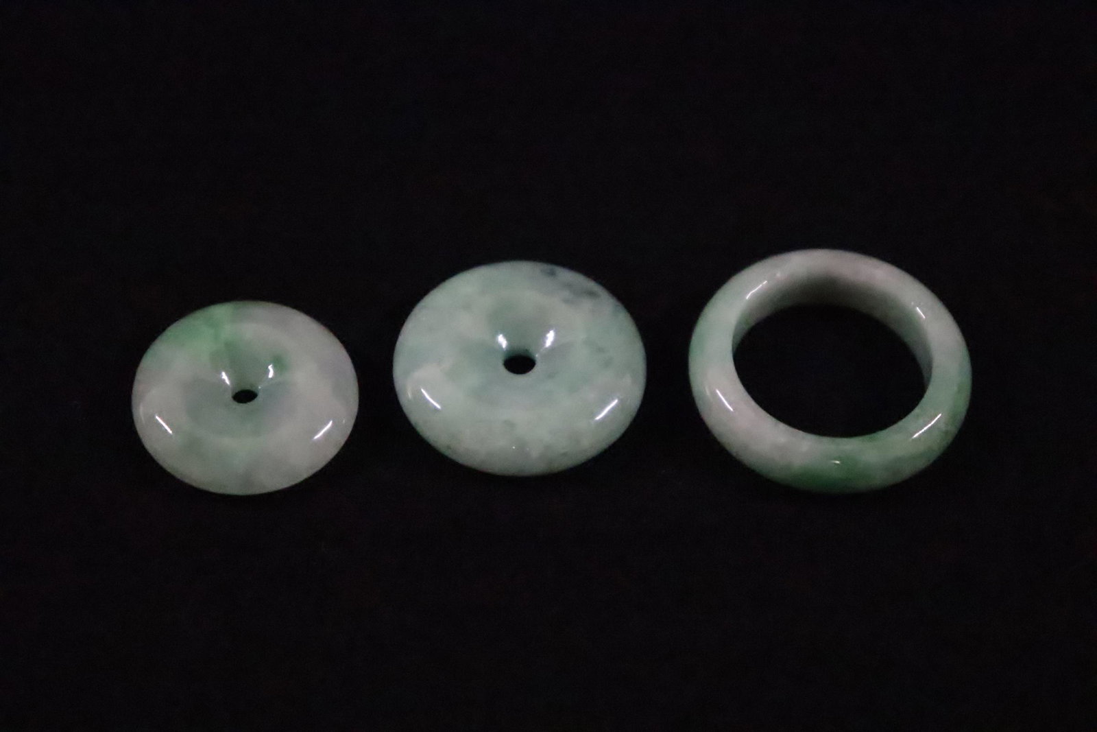 2 small jadeite discs and a jadeite ring: 2 small jadeite discs (0.2"x0.88"dia, 0.25"x0.95"dia) and a jadeite ring (0.25"x1.08"dia)
