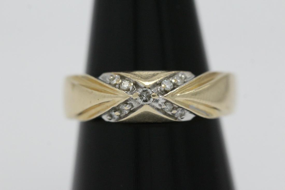 14K Y/G cross design diamond ring: 14K Y/G cross design diamond ring, tdw approx. 0.15ct, wt. 4.2gm, size 7