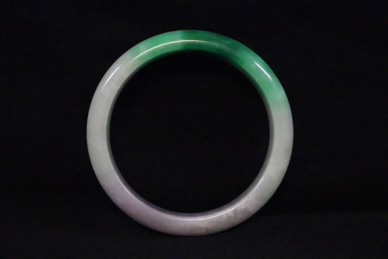 A jadeite like bangle: A jadeite like bangle, 0.55"x3"od(2.33"id)