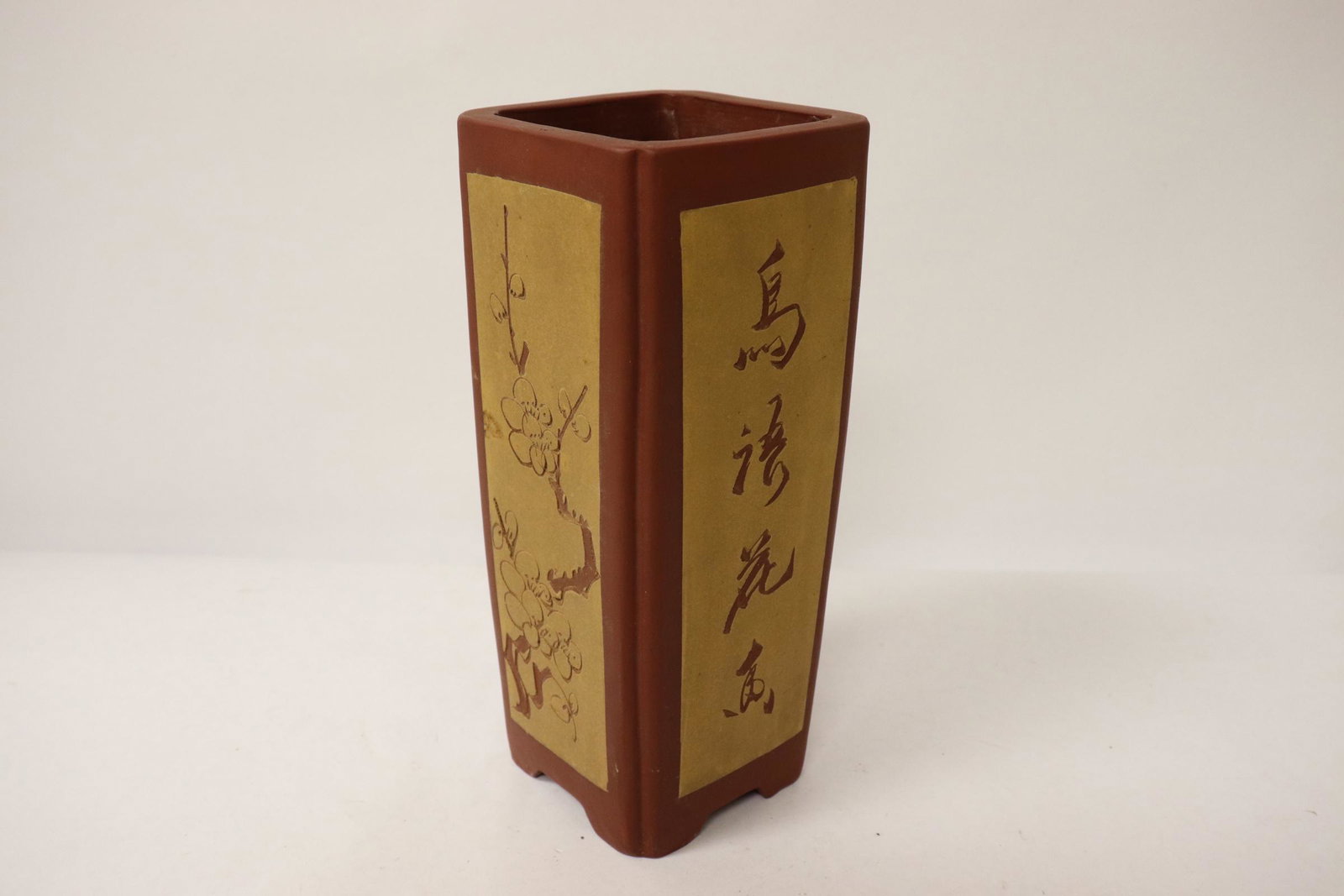 A Yixing square vase with calligraphy: A Yixing square vase with calligraphy, 8.05"Hx3.45"x3.45"