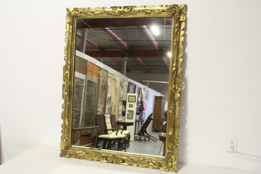 A finely carved vintage giltwood wall mirror (1 of 9)