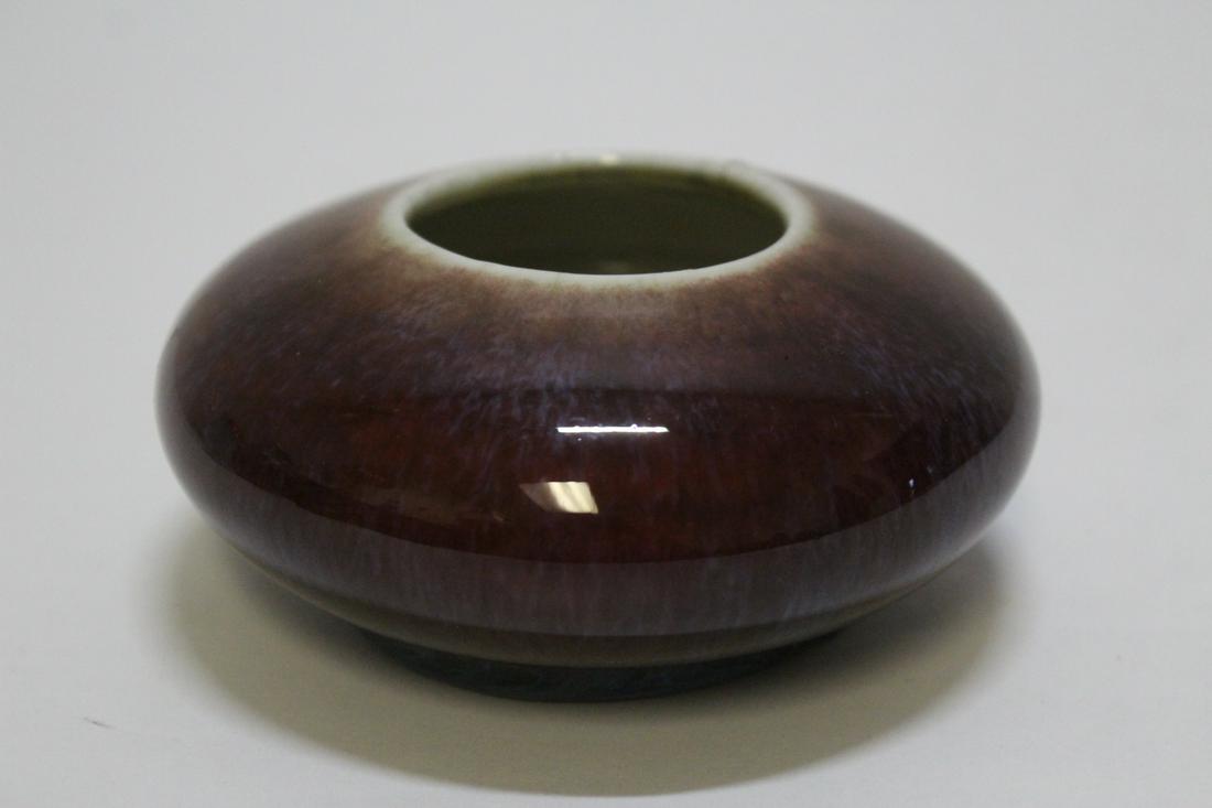 Chinese antique red glazed water dripper: Fine Chinese antique red glazed water dripper, rim has a small repair, 2"Hx4.25"dia