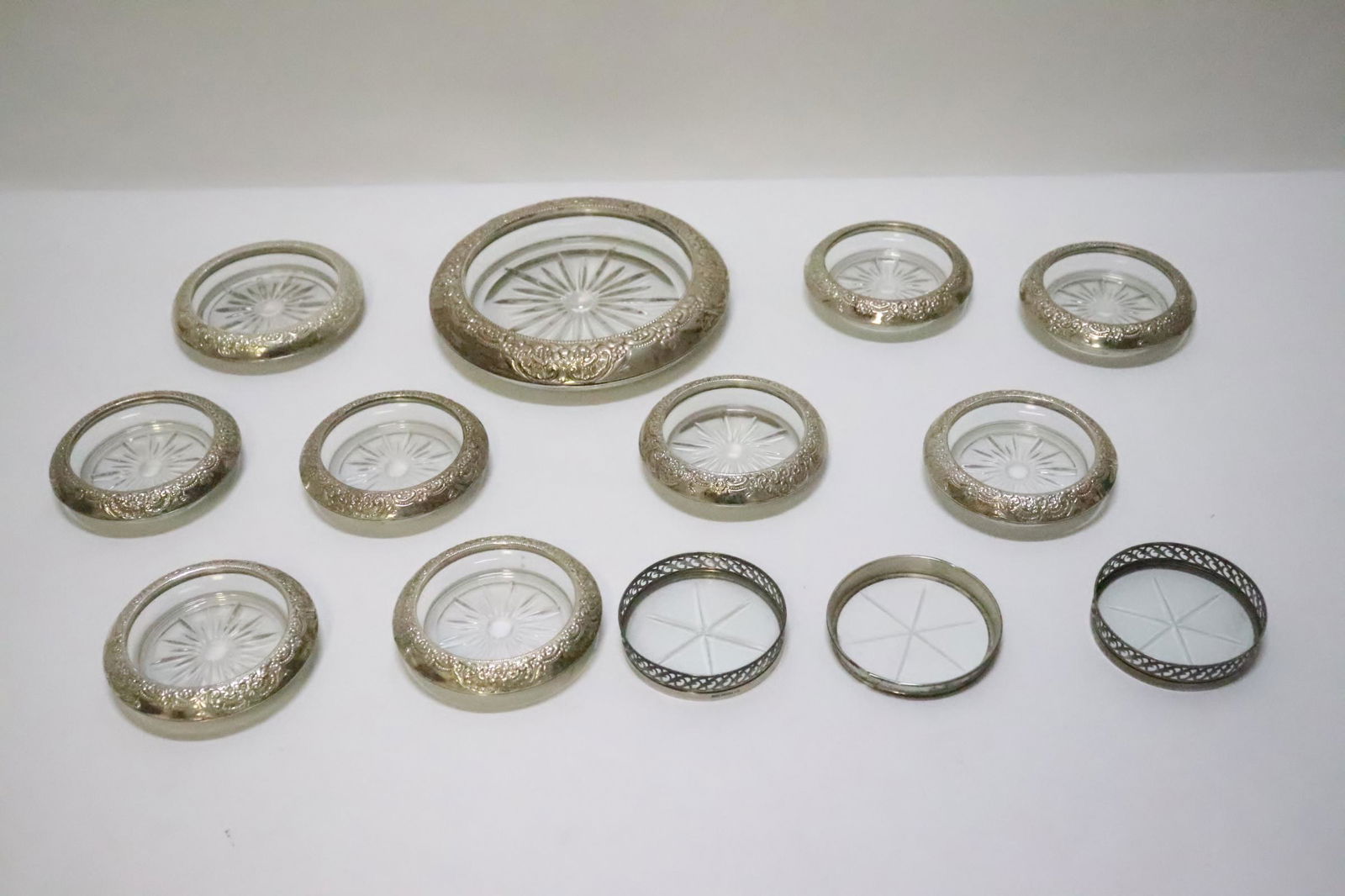 13 sterling and glass trays: 13 sterling and glass trays, 0.4"x3.18"dia - 1.35"Hx6.85"dia