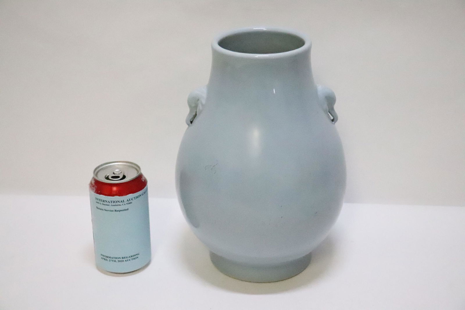 Chinese antique sky blue porcelain jar: A fine Chinese antique sky blue porcelain jar, the handles in elephant motif, minor repair, 10.75"Hx7.5"dia