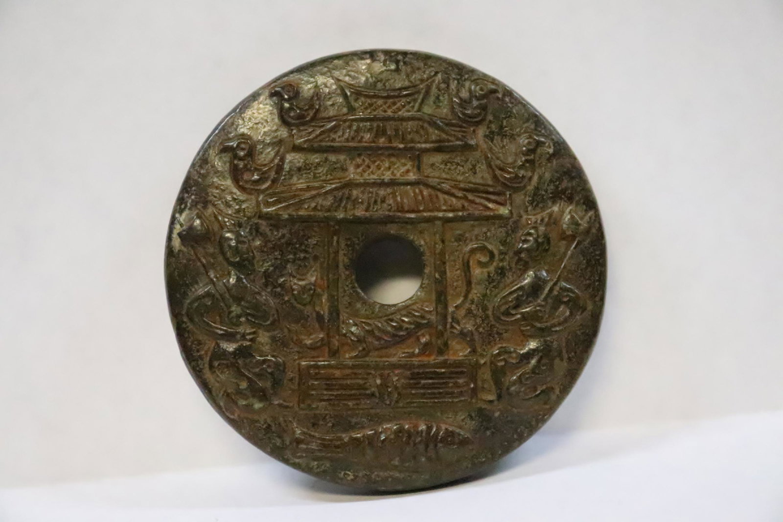 A fine Chinese vintage brown jade carved disc: A fine Chinese vintage brown jade carved disc, 0.45"x2.68"dia