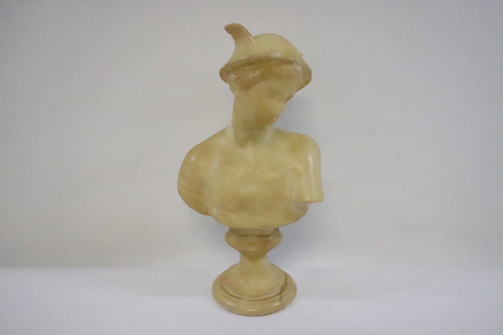 Alabaster sculpture boy: Alabaster sculpture boy, chip on hat and base crack, 9.85"H